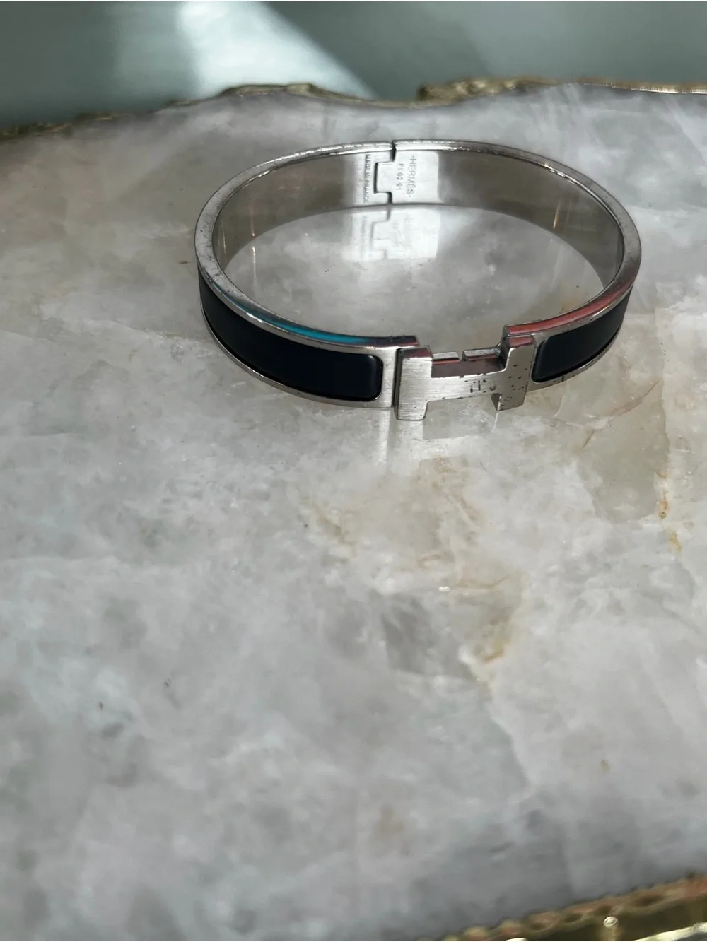 Hermes Silver-Tone Bracelet with Black Enamel H Detail